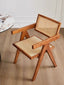 Front view of Nullah Rattan Dining Arm Chair showcasing solid wood frame and rattan seat