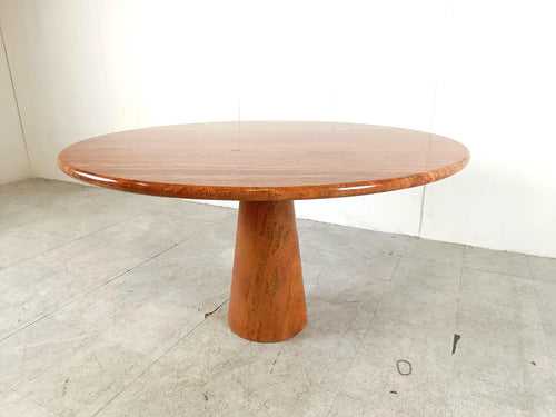 Dario round red travertine dining table