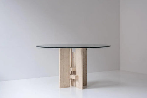 Travertine table with sculptural base designed