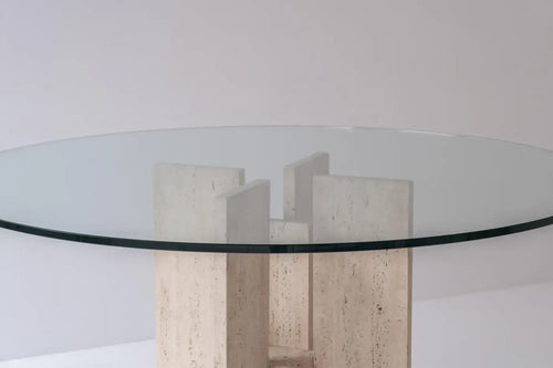 Travertine table with sculptural base designed