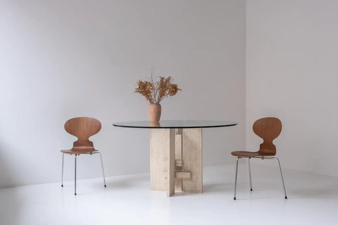 Travertine table with sculptural base designed