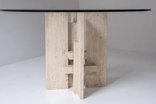 Travertine table with sculptural base designed