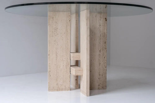 Travertine table with sculptural base designed