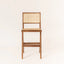 Armless stool featuring a sleek ash wood frame and rattan details.