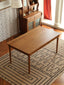 Dining Table Top View: Warm-toned wood table, spacious and elegant.