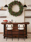 Black metal counter stools with beige fabric upholstery