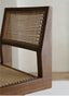 Handwoven Rattan: Natural and elegant seat and backrest.