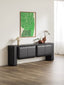 Modern living space featuring black wooden storage unit with curved design