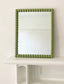 Rectangular mirror with blush pink beaded frame border