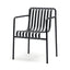 Black Chair: Black slatted iron armchair, modern and sleek.