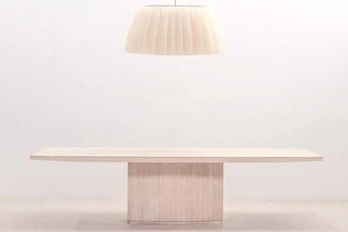 Travertine dining table by Willy Rizzo