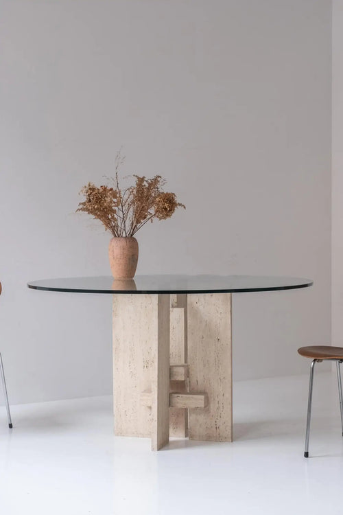 Travertine table with sculptural base designed