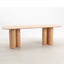 Minimalist dining table with natural oak wood grain.