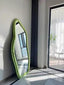 Floor-length mirror with curved green flannel fabric border