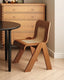 Vintage-inspired brown dining chair with a sleek modern design